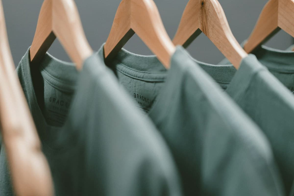 Knit garments on hangers representing apparel and textile sourcing
